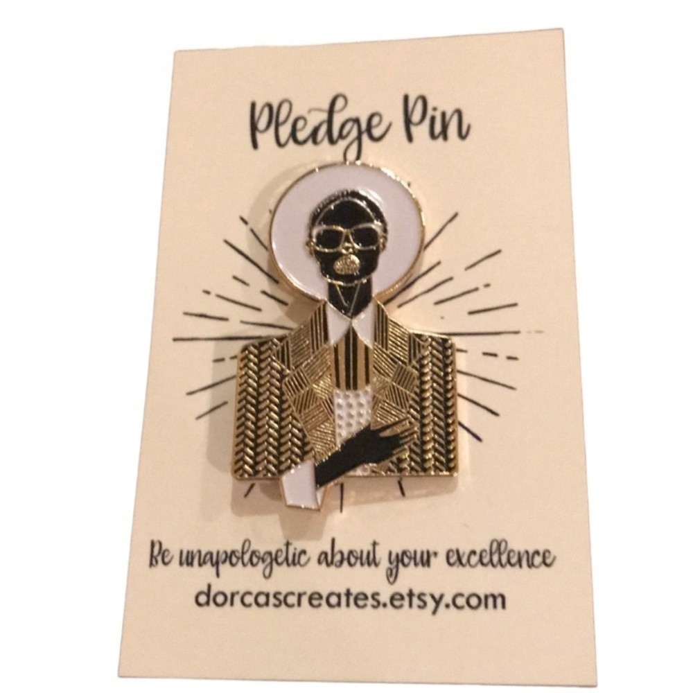 Gorgeous gold, black, and white pledge lapel pin.